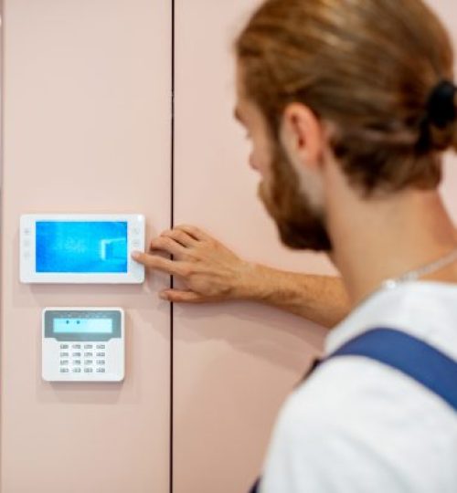 workman-setting-up-the-video-on-the-intercom-2022-02-07-10-54-13-utc-600x400